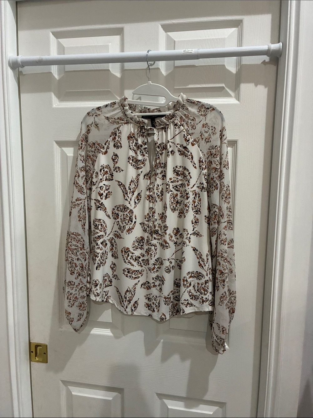 White House Black Market Elegant Cream Blouse with Brown Floral Print